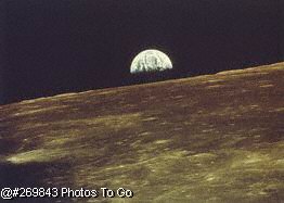 Earth rise over moon surface
